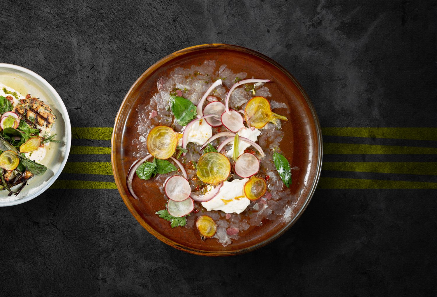 Cured kingfish over ice with radish and citrus